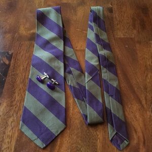 Striped purple and green tie with purple cufflinks